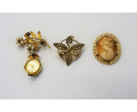 A Rotary 9ct gold, garnet and cultured pearl set lady's watch brooch, the pendant watch with a signed circular silvered dial,