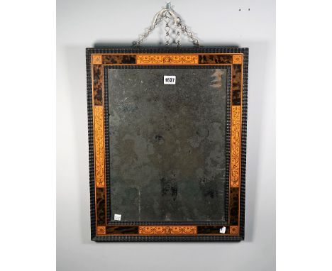 A 19th century Anglo Indian rectangular mirror, the tortoiseshell and pen work sandalwood frame with ebonised wriggle work de