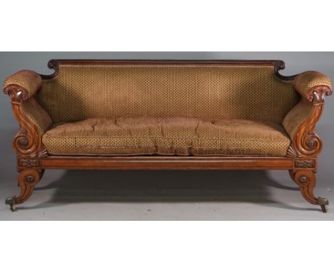 A George IV mahogany scroll end sofa with cornucopia carved arms on outswept sabre supports, 210cm wide x 93cm high. 