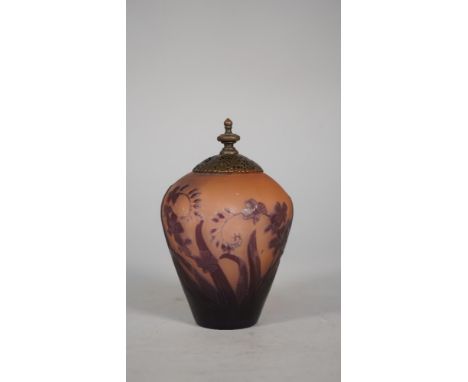 A Galle cameo glass vase with later lid and internal light, circa 1900, purple foliate decoration against a pink ground, sign