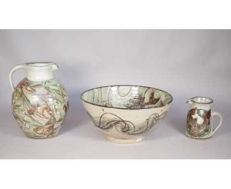 Colin Kellam (born 1942), a stoneware jug, basin and a smaller jug, each painted in iron-red, blue, brown and green with swim