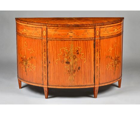 A George III style floral marquetry inlaid satinwood and mahogany demilune commode, with single door, on tapering square supp