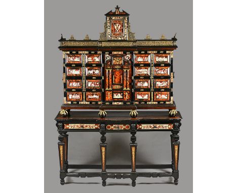 A late 19th century South German gilt metal mounted ivory, tortoiseshell, rosewood and ebonised cabinet on stand, the pierced