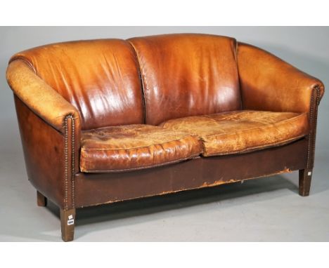 A modern brown leather upholstered tub back sofa on tapering block supports, 150cm wide x 77cm high. 