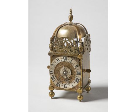 A miniature brass verge lantern timepiece with alarm In the late 17th century style, inscribed John Knibb, OxonOf usual form,