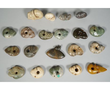 A group of twenty Hongshan style jade zhulong pendants, of various colour and size, 4cm. to 7cm. wide, (20).