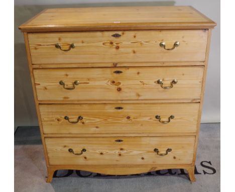 A George III pine chest of four long graduated drawers on splayed bracket feet, 107cm wide x 110cm high. 