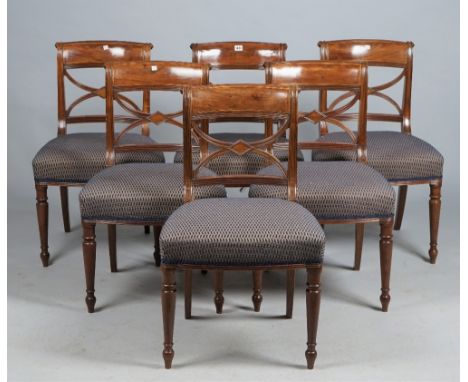 A set of six George III mahogany dining chairs with 'X' frame splat and bow seat on turned supports, 50cm wide x 82cm high. (