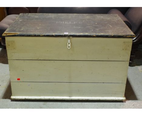 An early 20th century white painted pine trunk, 107cm wide x 68cm high. 