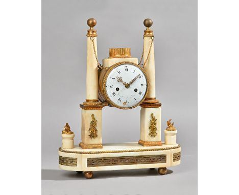 A FRENCH GILTMETAL-MOUNTED MARBLE MANTEL CLOCKEarly 19th century and laterModelled with a drum-shaped case, supported between