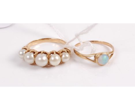 A yellow metal and cultured pearl five stone dress ring, unmarked, but tests as approx 14ct, 4.3g, together with one other op