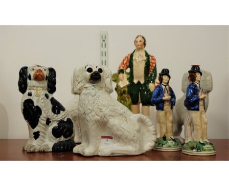 A pair of double sided Staffordshire figures titled to the base Rum &amp; Water, and Gin &amp; Water, height 22cm, together w