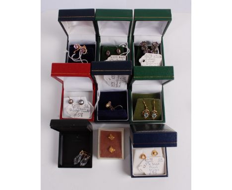 A collection of principally 9ct gold semi-precious set ear studs, to include amethyst, blue topaz, and seed pearl set example