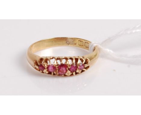 An 18ct gold five ruby set ring, 2.1g, size I