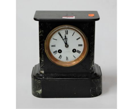 A late 19th century marble cased mantel clock having a circular enamel dial with Roman numerals and eight day movement striki