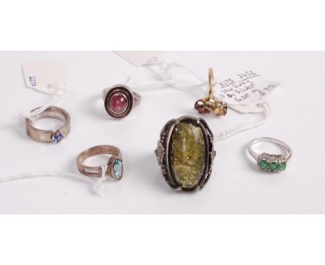 A collection of various silver, semi-precious and paste set rings, to include star ruby example