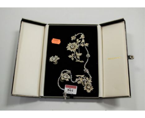 Mitchel Maer for Christian Dior - a suite of white metal and paste set jewellery, comprising necklace with flower head and le