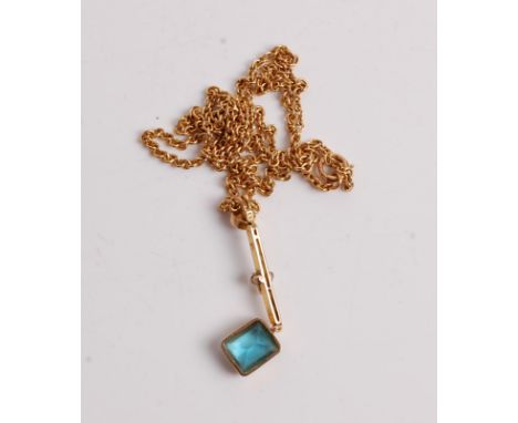 A 15ct gold, blue topaz and seed pearl set pendant, 35mm, on 15ct gold finelink neck chain, gross weight 7.1g