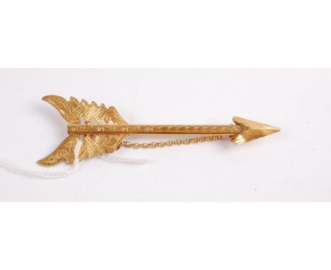 A Victorian silver gilt arrow brooch with safety chain, maker H&T 10cm.Minor bending to edges, otherwise in very good conditi