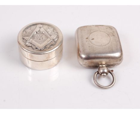 A silver sovereign case of square section with fine engine turned decoration together with Masonic silver pill box (2).Sovere