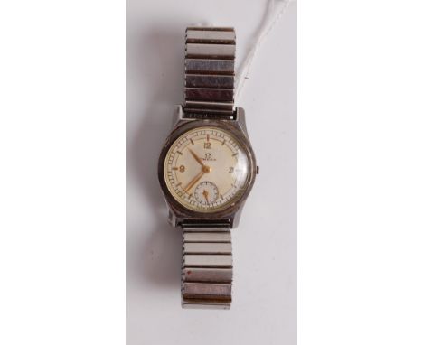 A 1960s gent's steel cased Omega wristwatch, having a signed silvered dial (discoloured), subsidiary seconds dial, and manual