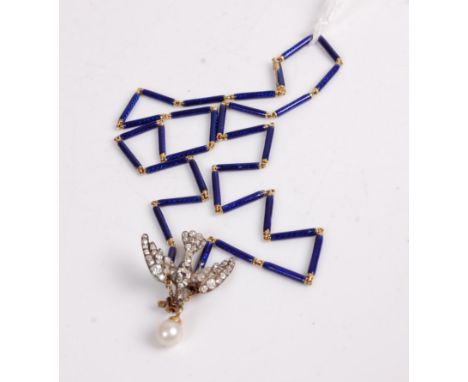 A Victorian diamond set swallow brooch, the swallow supporting a single pearl in its beak, the body and wings all-over set wi