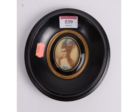 20th century Continental school - Bust portrait of a maiden, miniature watercolour heightened in white, 6 x 4.5cm, housed in 