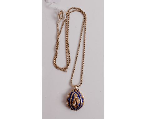 The House of Fabergé silver gilt and enamel Imperial pearl egg timepiece, on neck chain, with certificate of authenticity