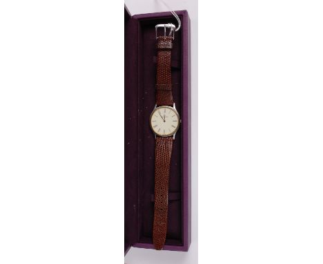 A gents Jaeger Lecoultre steel cased quartz wrist watch having a signed champagne dial, back cover numbered 146.112.5 140.112