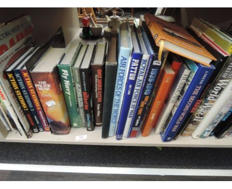 A shelf of volumes including World War Two interest, motoring and aviation interest