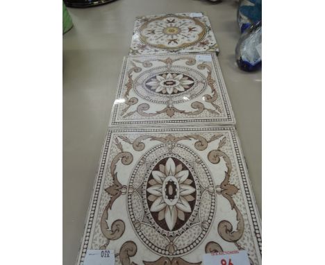 Three ceramic tiles, two marked No.300JHL 