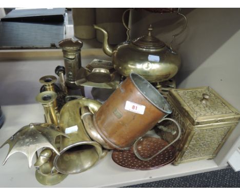 A selection of brass and copper including  vintage car horn, trivet, candlesticks and tea caddy etc