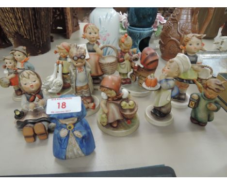 Eleven Hummel figurines, including meditation, doctor, baker, chick girl, goodnight etc