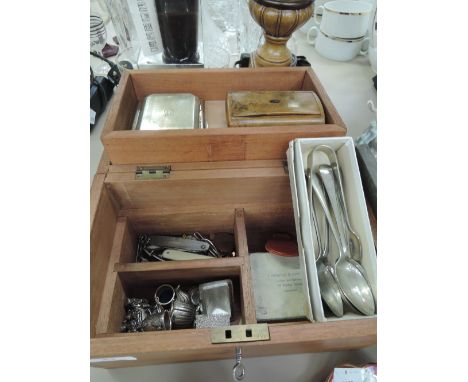 A wooden box containing a veneered snuff box, two engine tooled cigarette cases and one treen case, a Park stopwatch etc