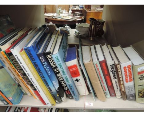 A shelf of various aircraft volumes