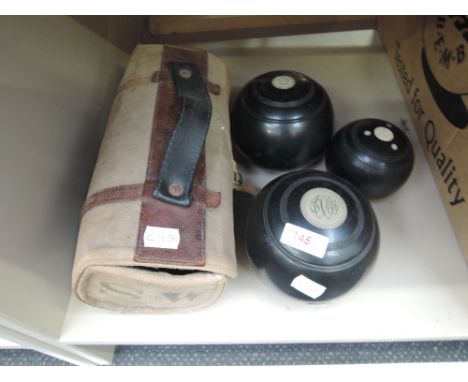 A pair of Greenmaster bowls and jack, and a pair of Dunlop bowls
