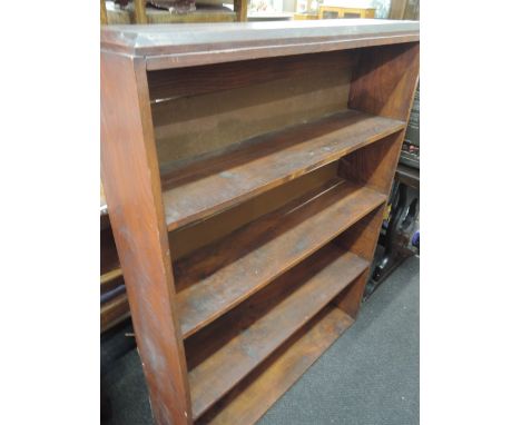 An early 20th century mahogany book shelf