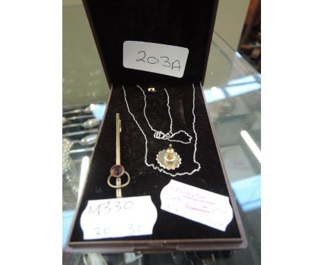 A gold plated stick pin and 9ct white gold chain etc