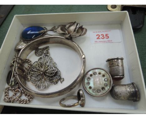 A small selection of white metal and HM silver jewellery including hinged bangle having scroll decoration, filligree necklace