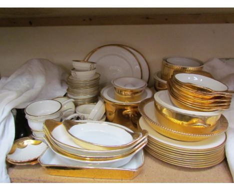 A Royal Worcester gilt decorated part dinner set together with a Royal Doulton gilt decorated part dessert set, Minton gilt d