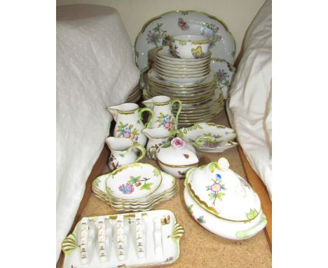 An Herend floral and butterfly decorated part tea and dinner set CONDITION REPORT: Surface scratches, gilding rubbed in place