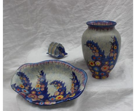 A Carlton Ware 'Garden' Revo bowl, pattern 3413. with a mottled blue ground painted with multiple flower heads to a royal blu