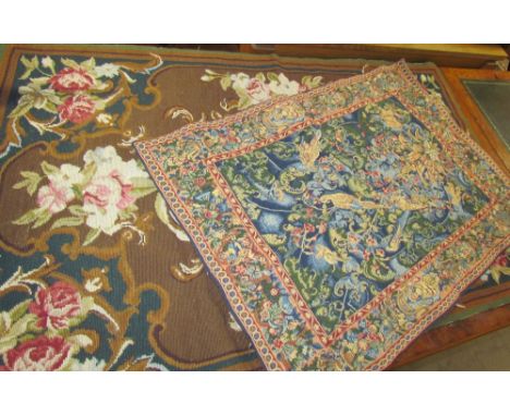 A woolwork wall hanging decorated with flowers and leaves together with Abelian tapestry wall hanging 