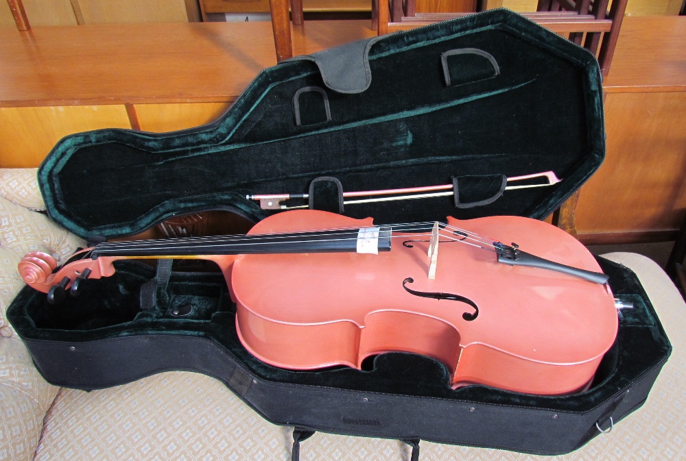 A Hudson MC760L, soft pink cello, with bow and case
