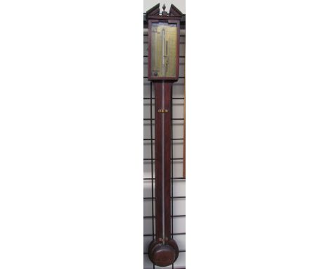 A George III mahogany stick barometer, the brass dial signed G Catelli &amp; Co. Hereford