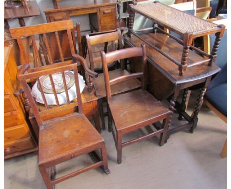 An oak gateleg dining table together with a bergère topped stool, pair of 19th century dining chairs, a commode elbow chair, 