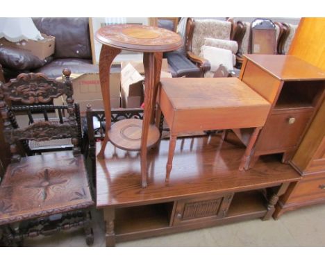 A 20th century oak coffee table together with a bedside cabinet, a commode, oak wine table and two dining chairs