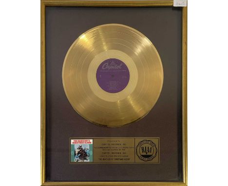 An official RIAA presentation gold disc award, given to Capitol Records to recognise sales of 500,000 copies of The Beach Boy