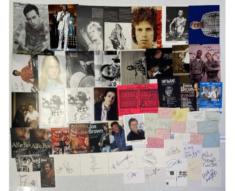 Extensive collection of approx 63 signed items, to inc: index cards, vintage autograph book pages, photographs and more. Sign