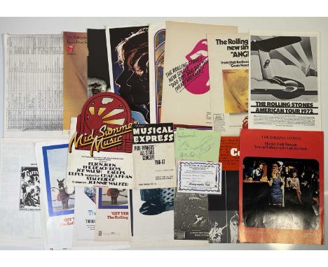 An assortment of music memorabilia to include: autograph book page signed by Glenn Tilbrook, Keith Wilkinson, Chris Difford a